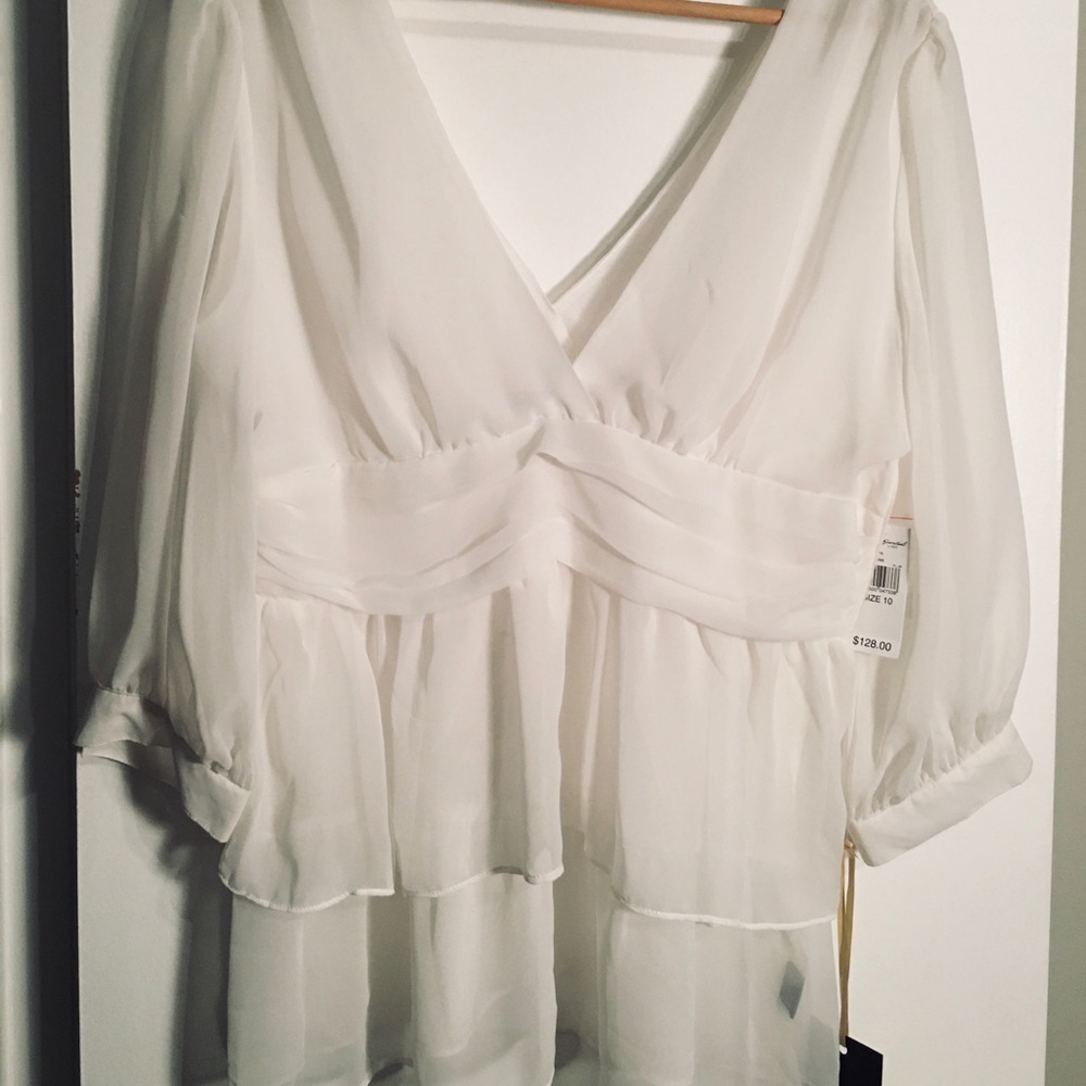Women’s new blouse by Essentials with tags
